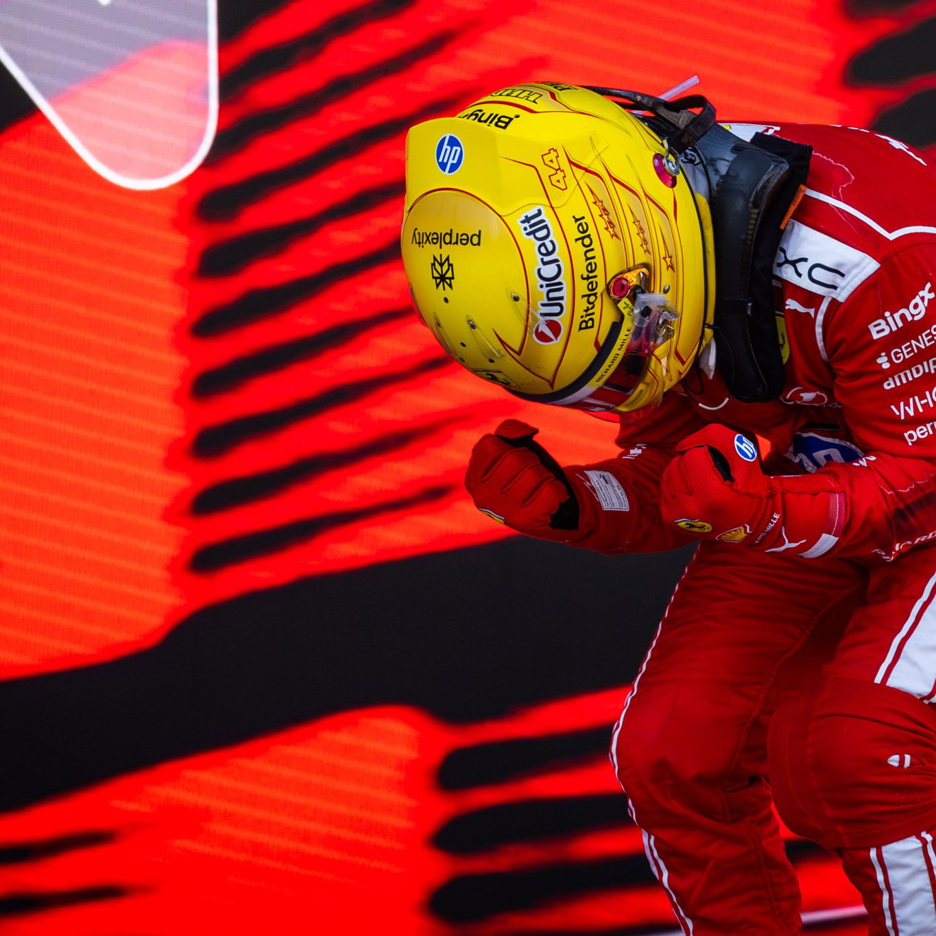 Hamilton celebrates his first Grand Prix victory as a Ferrari driver