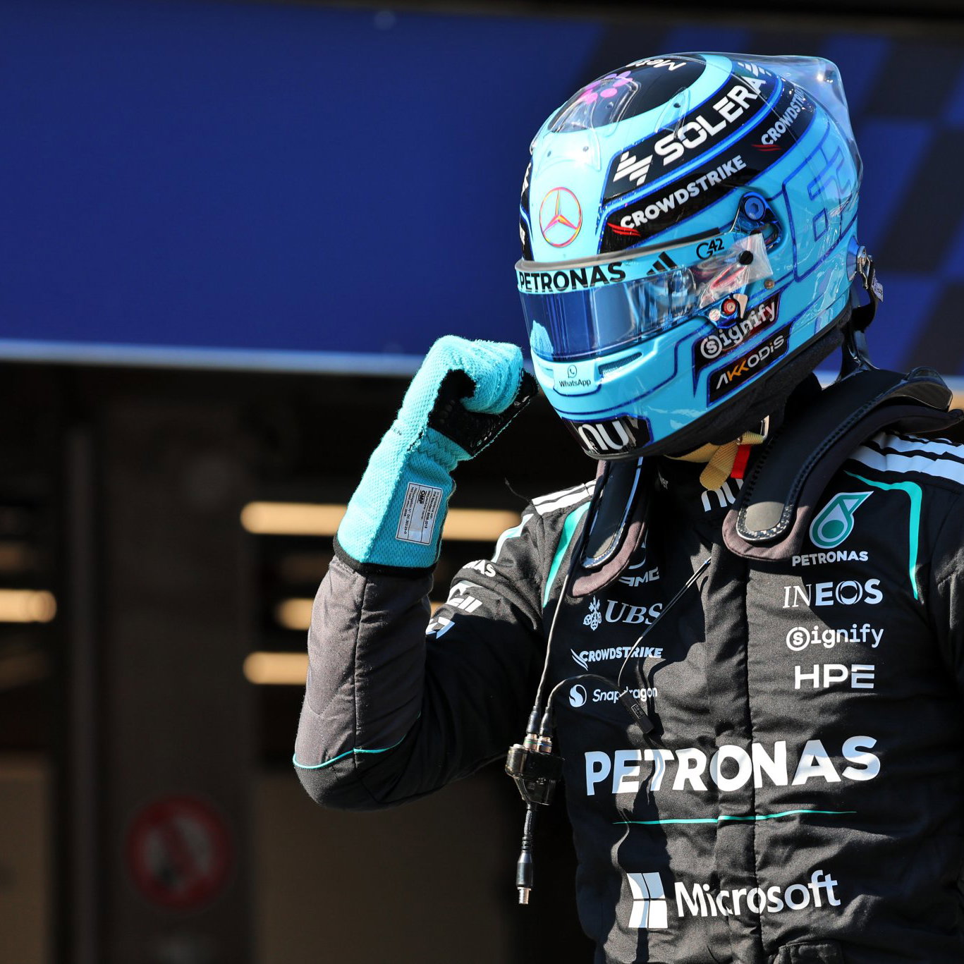 Russell celebrates a controversial pole