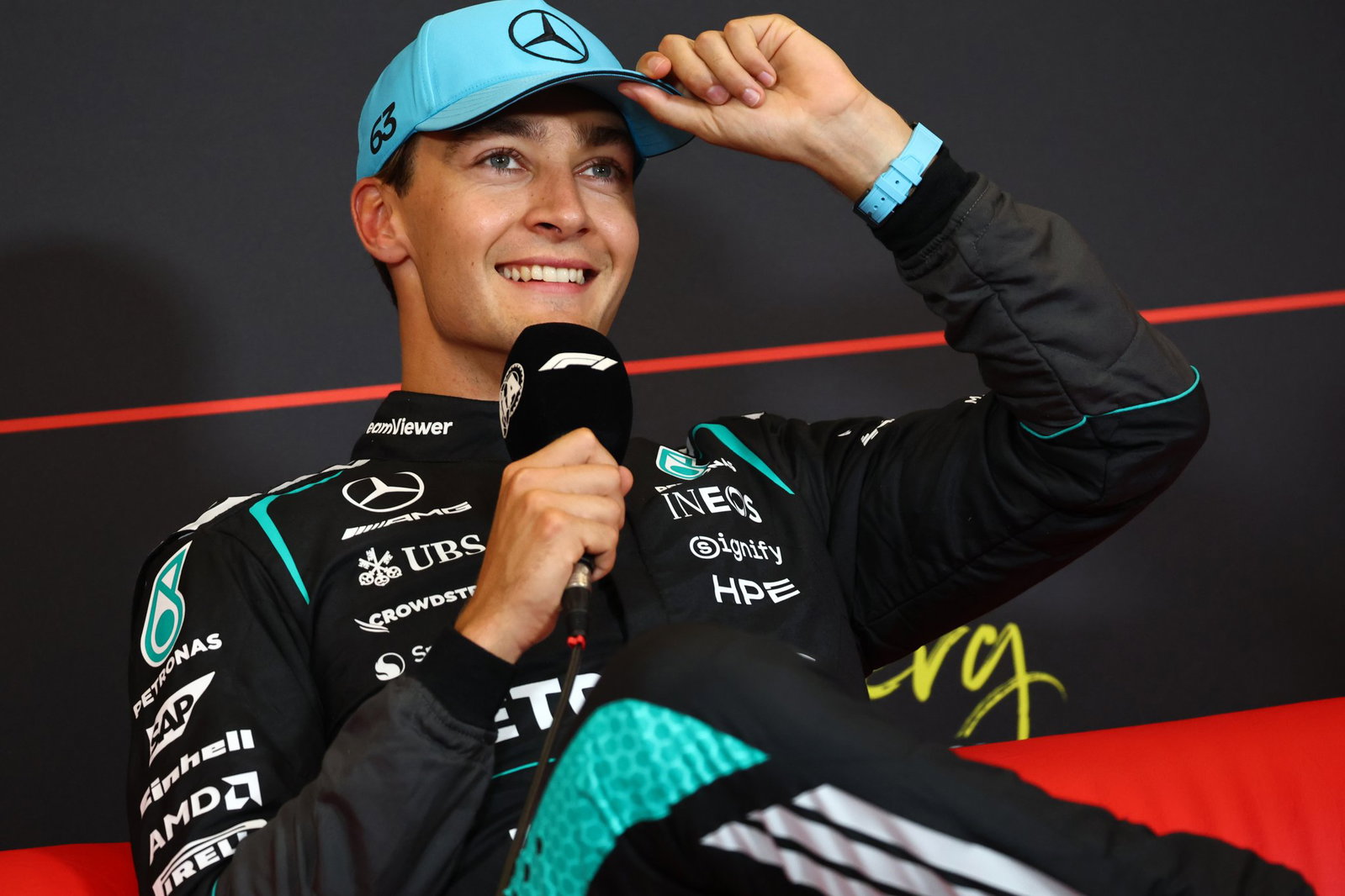 Russell was all smiles after securing a crucial pole