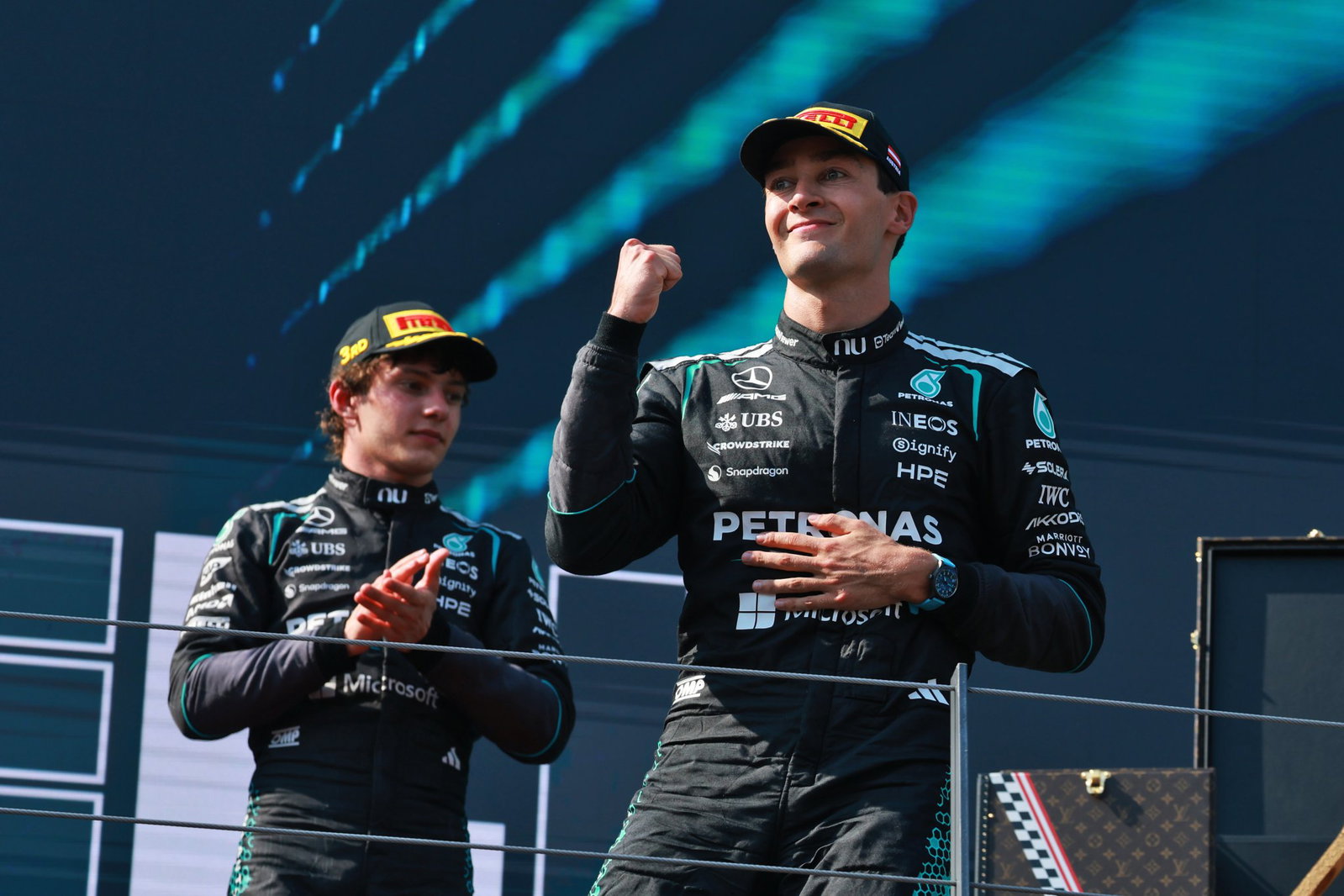 Russell celebrates in front of Antonelli in Austria