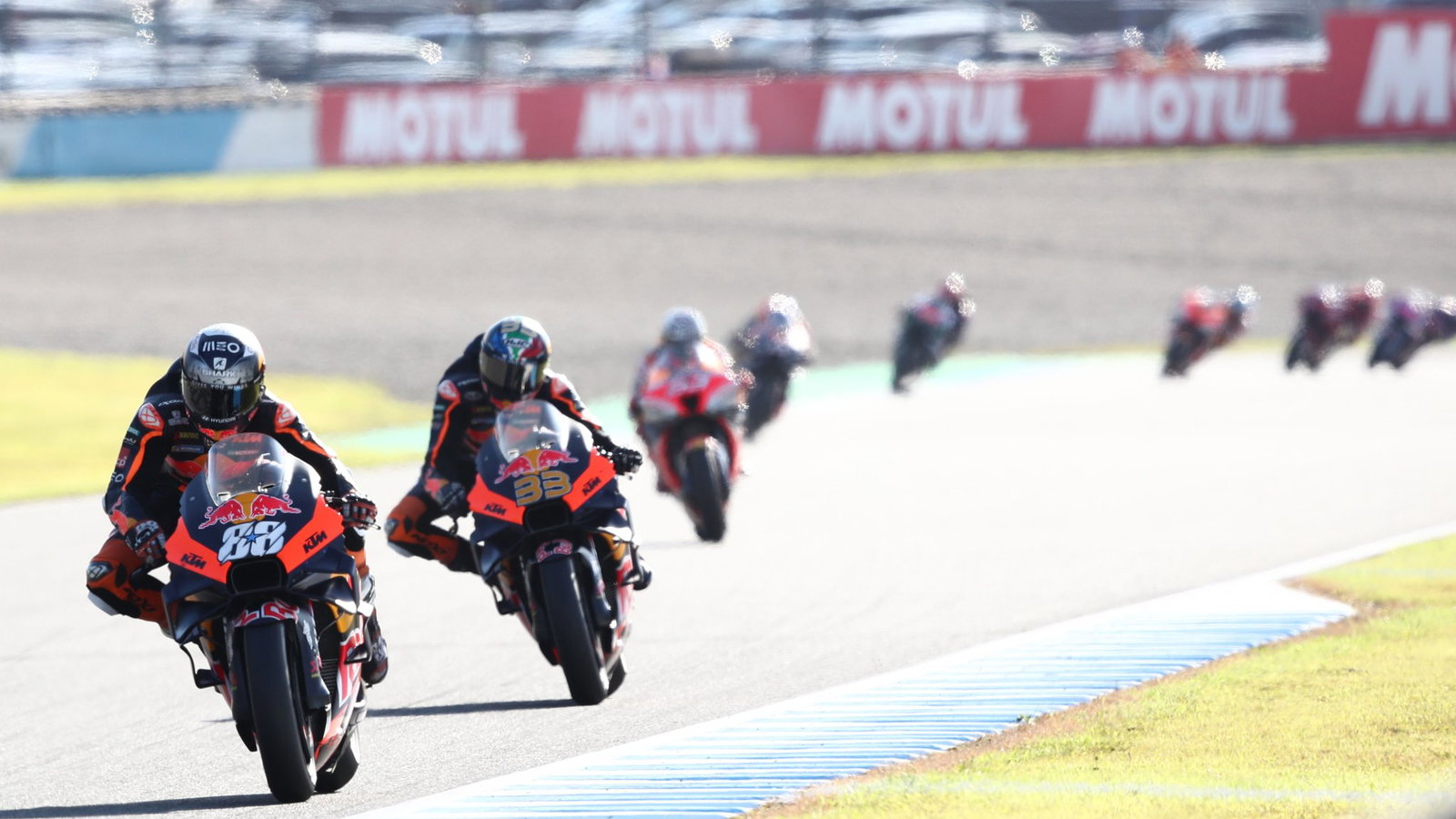 Miguel Oliveira leads Brad Binder, 2022 MotoGP Japanese Grand Prix. Credit: Gold and Goose.