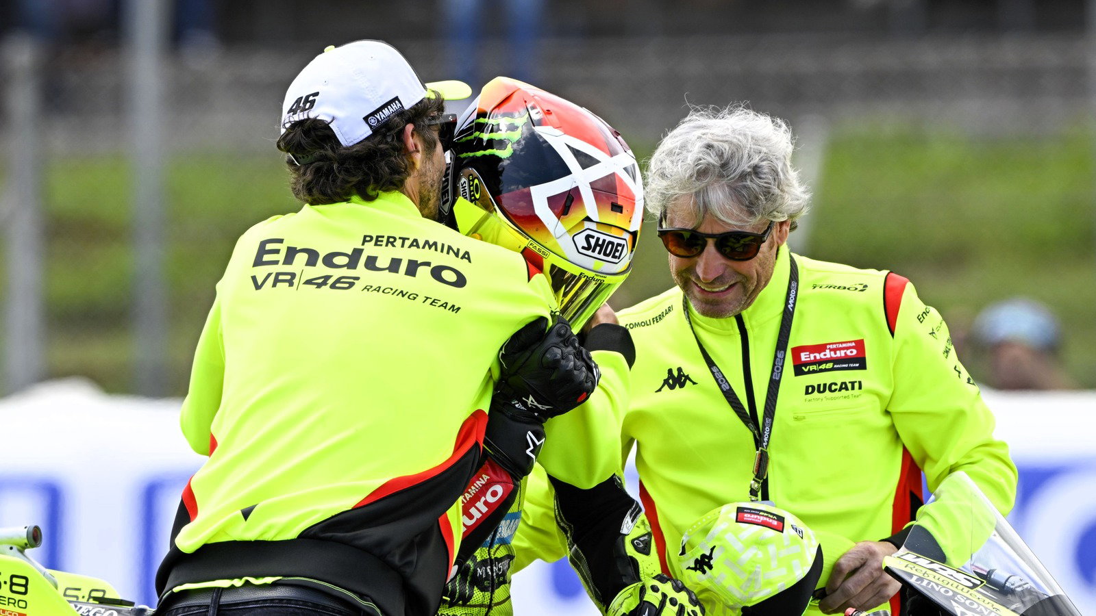 Valentino Rossi congratulates Fabio di Giannantonio on Catalunya victory.