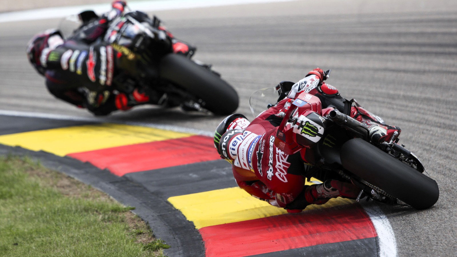 Pecco Bagnaia chases Jorge Martin, 2026 Sachsenring MotoGP. 