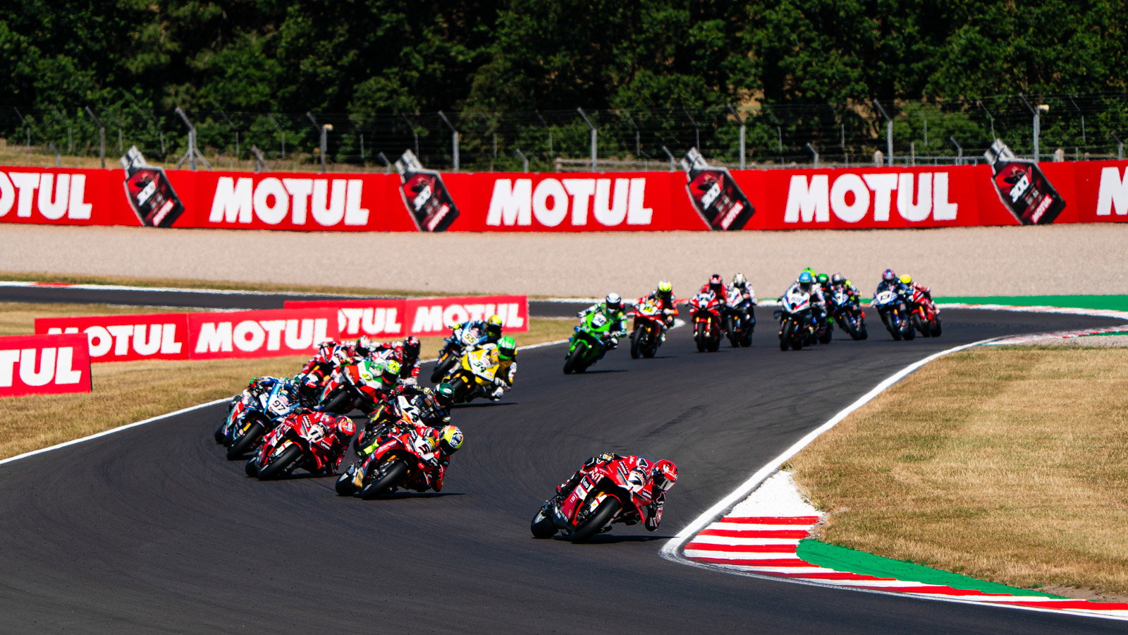 Iker Lecuona leads the field at 2026 UK WorldSBK, Superpole Race. Credit: Tony Goldsmith.
