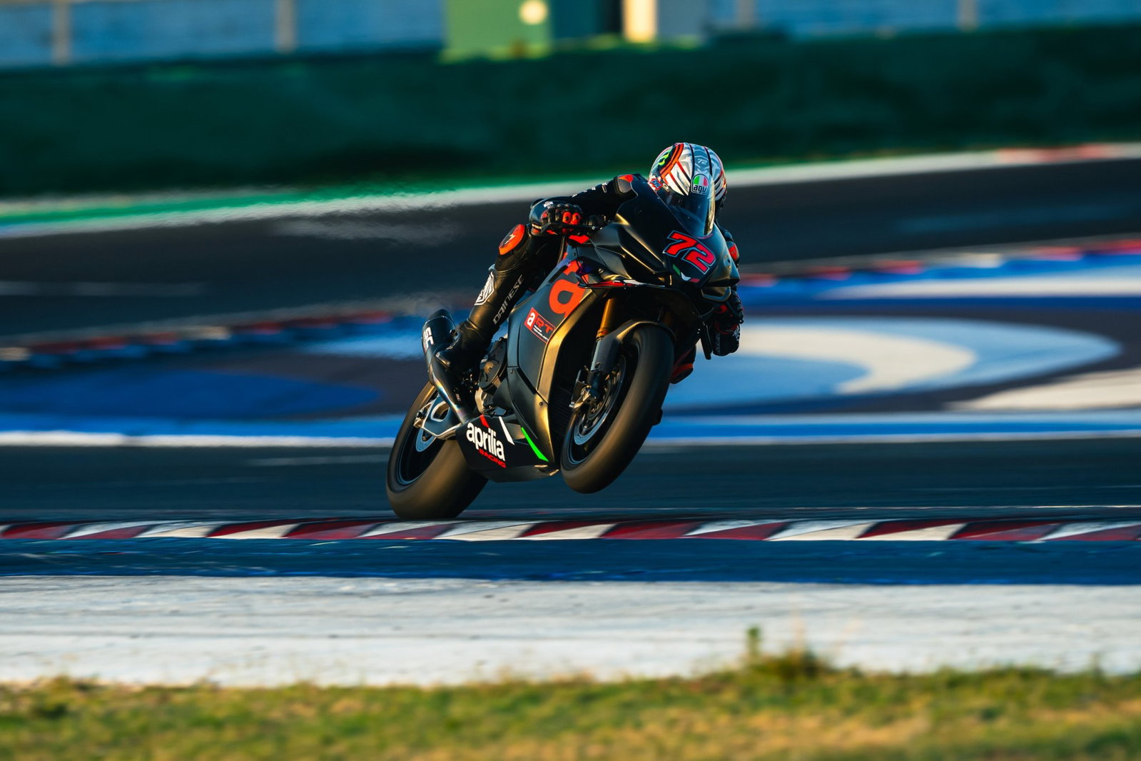 Marco Bezzecchi rides an RSV4 Aprilia at Misano