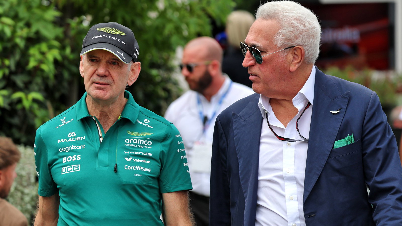 Lawrence Stroll and Adrian Newey enter the paddock