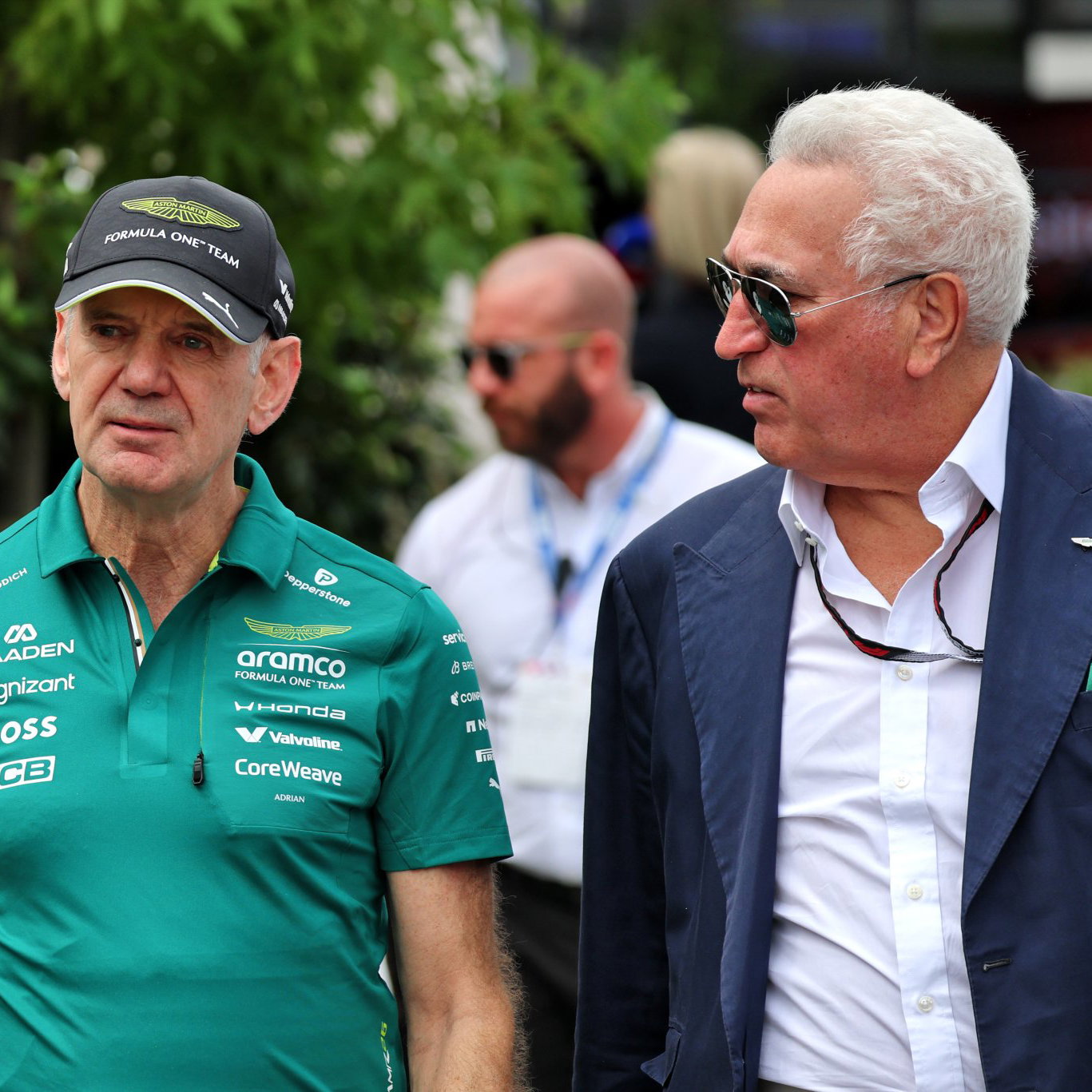 Lawrence Stroll and Adrian Newey enter the paddock