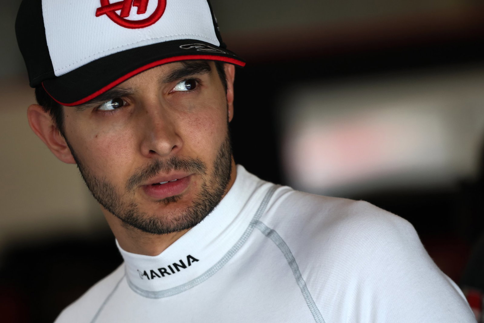 Ocon is facing the exit door at Haas