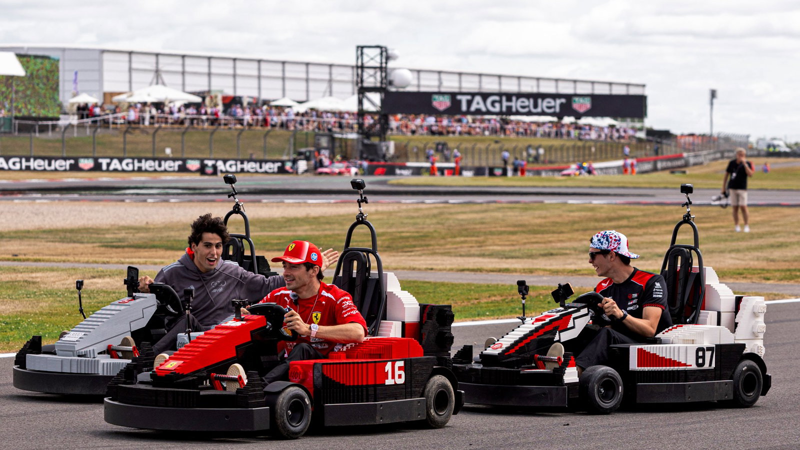 Gabriel Bortoleto, Charles Leclerc and Oliie Bearman drive lego cars