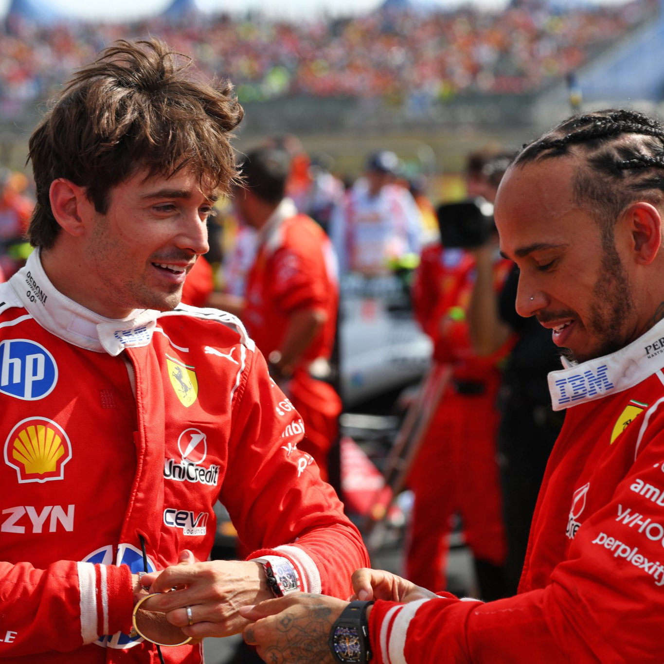 Hamilton puts his Richard Mille watch on after the British Grand Prix