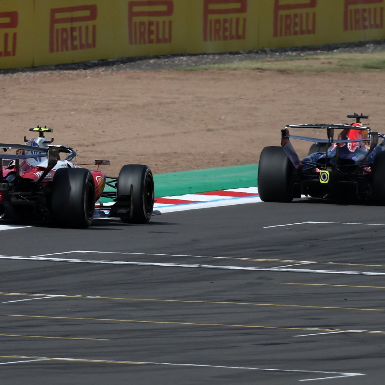 Ferrari and Red Bull's rear wings are under scrutiny