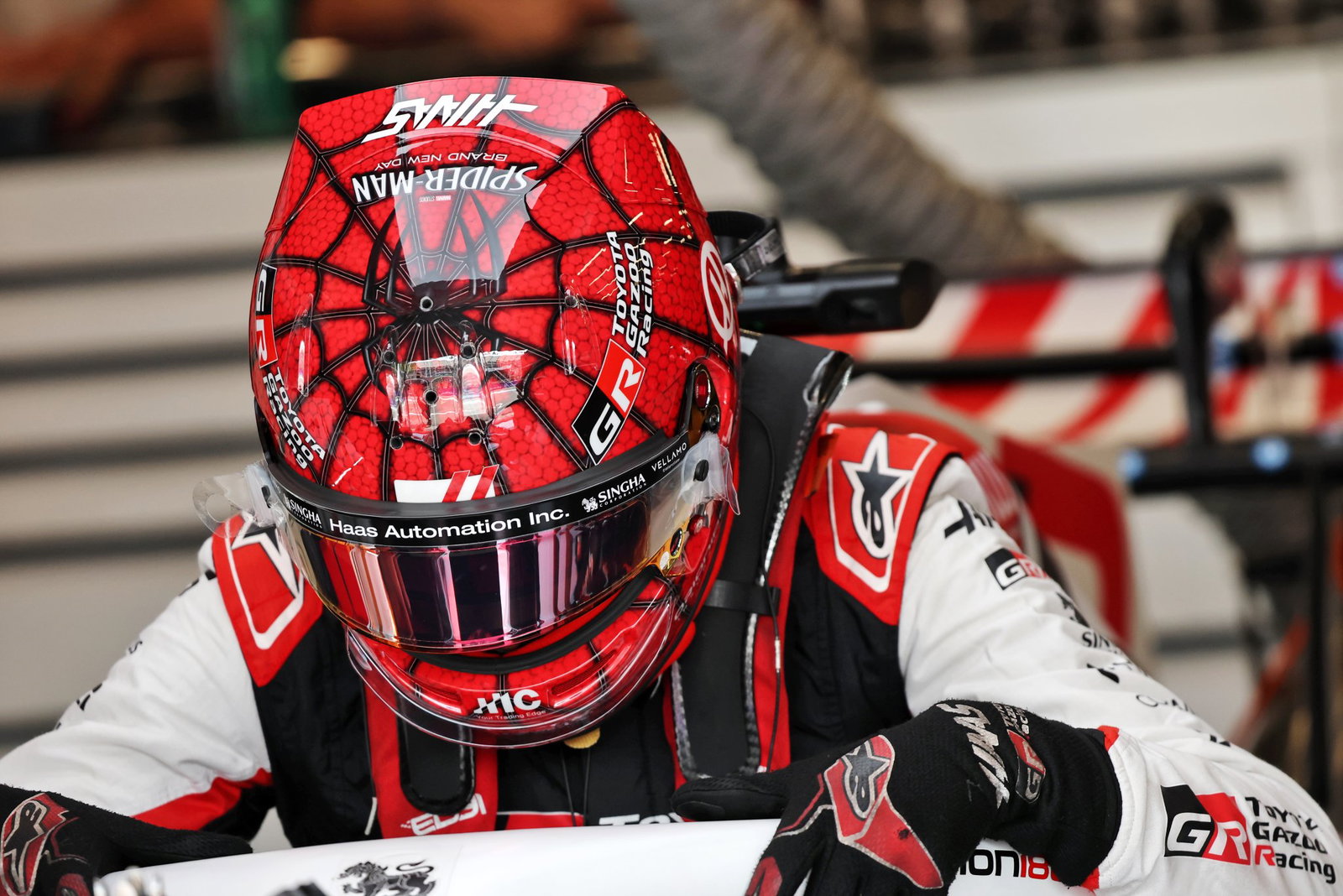 Ocon is wearing a Spiderman helmet at Spa