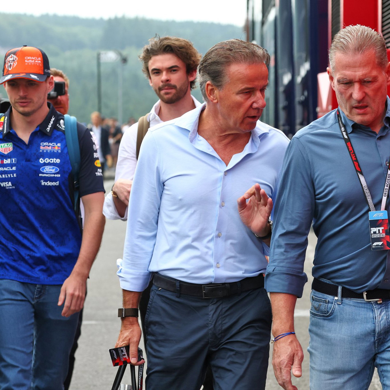 Jos Verstappen and Raymond Vermeulen talk in the F1 paddock