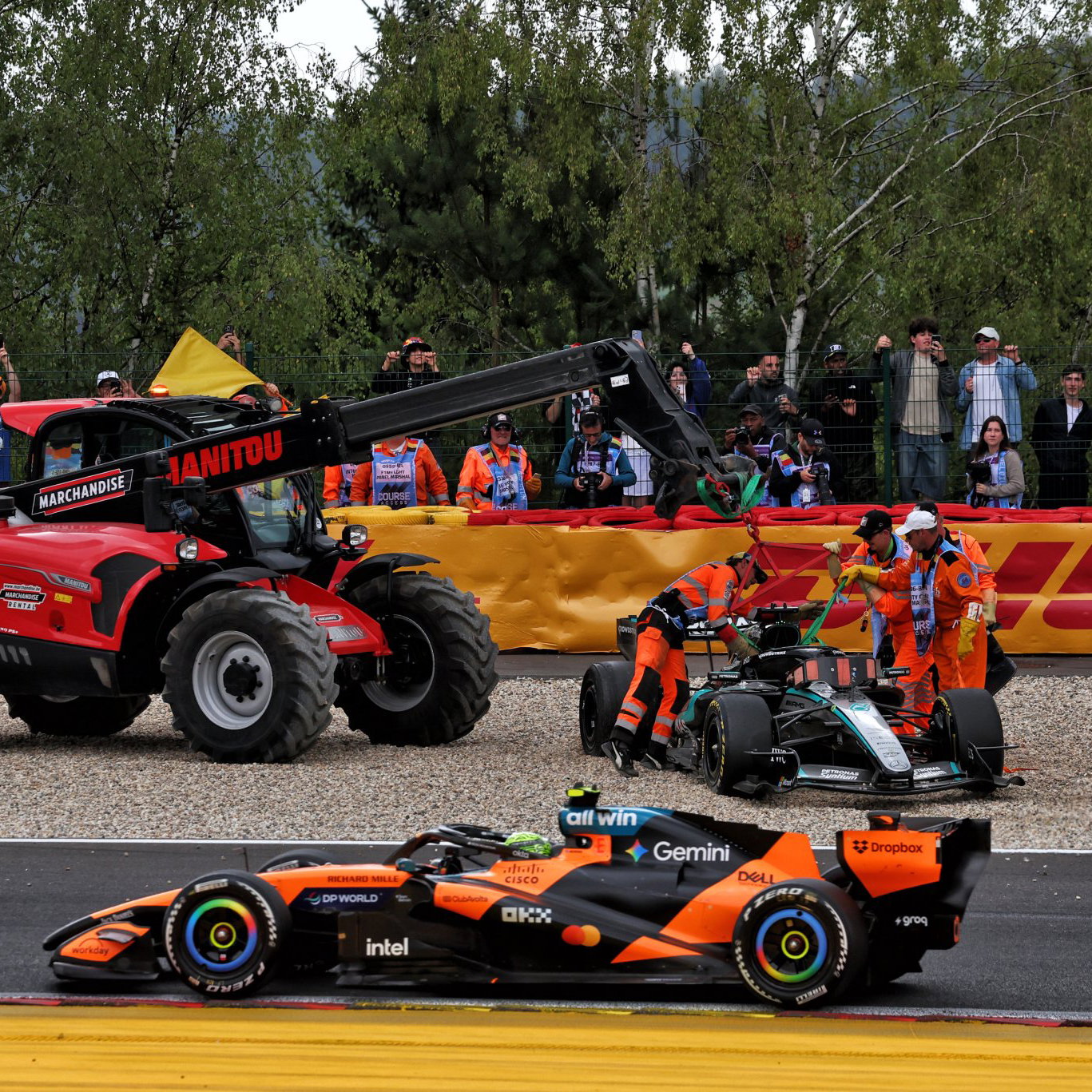 Russell's car is craned away after his collision