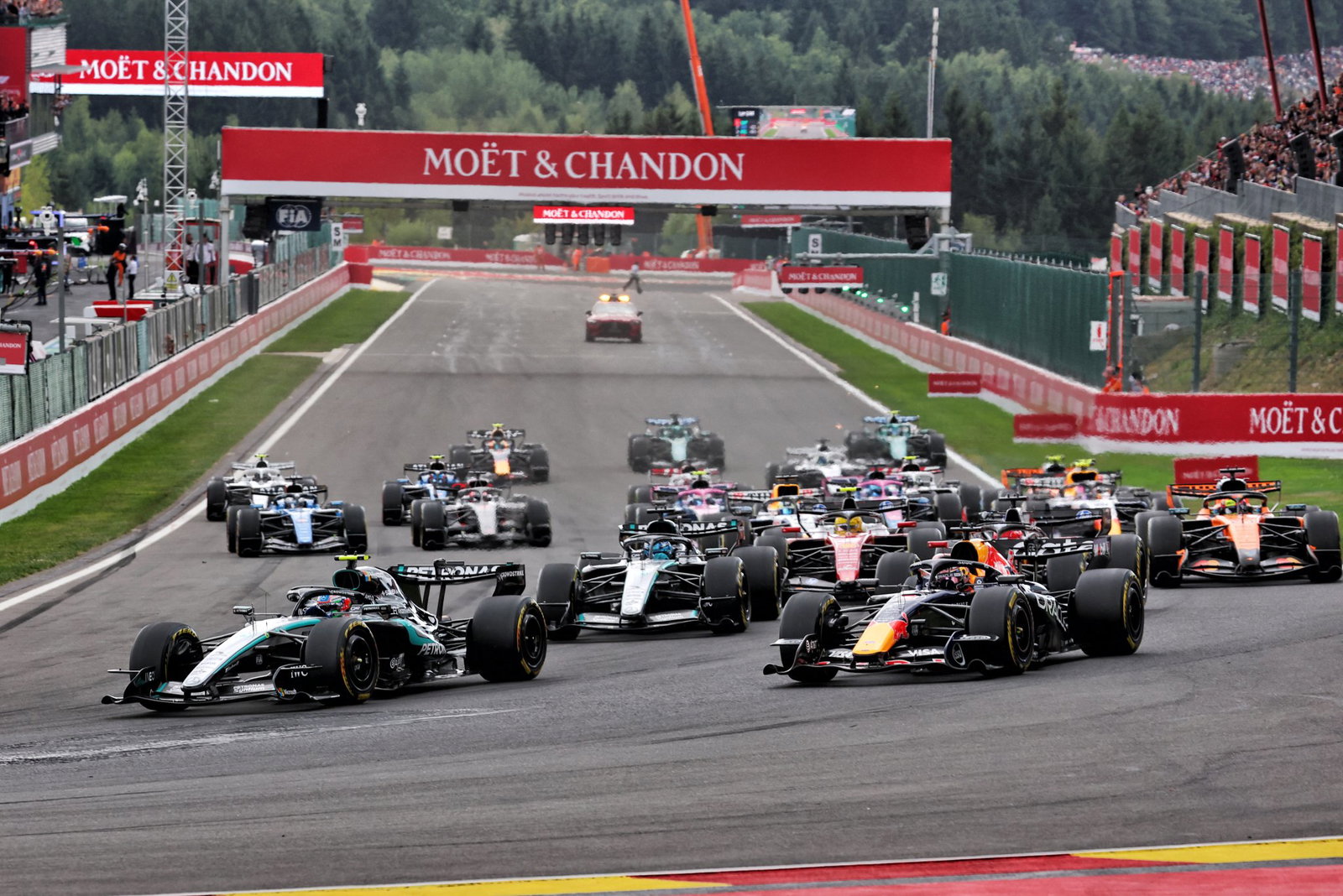 Antonelli led into Turn 1, but briefly lost out to Verstappen