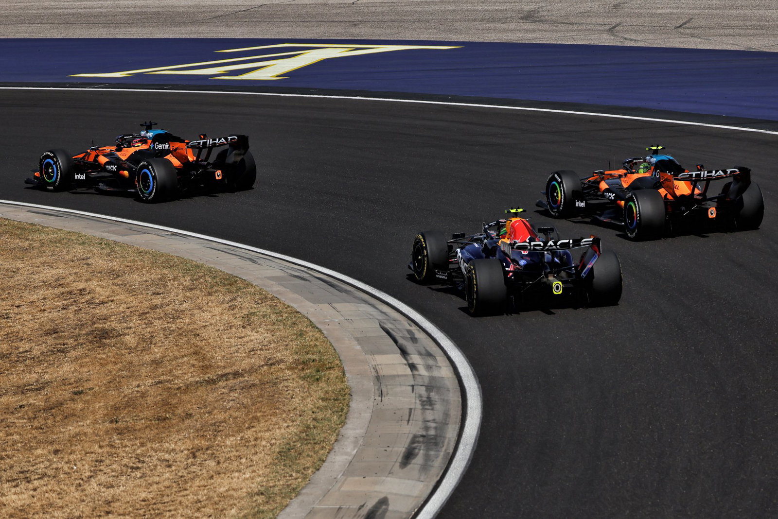 Norris lost the lead by running wide at Turn 2 at the start
