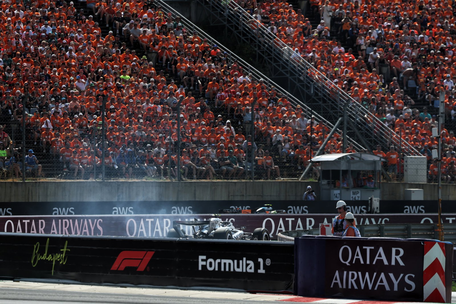 Bottas enters the pits with a brake fire
