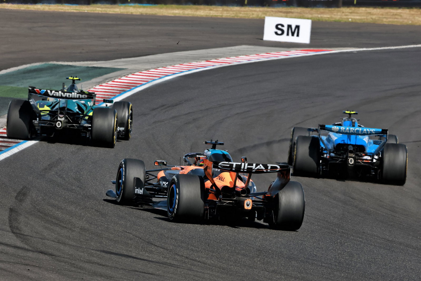 Piastri and Sainz, seconds before making contact, at the Hungarian GP