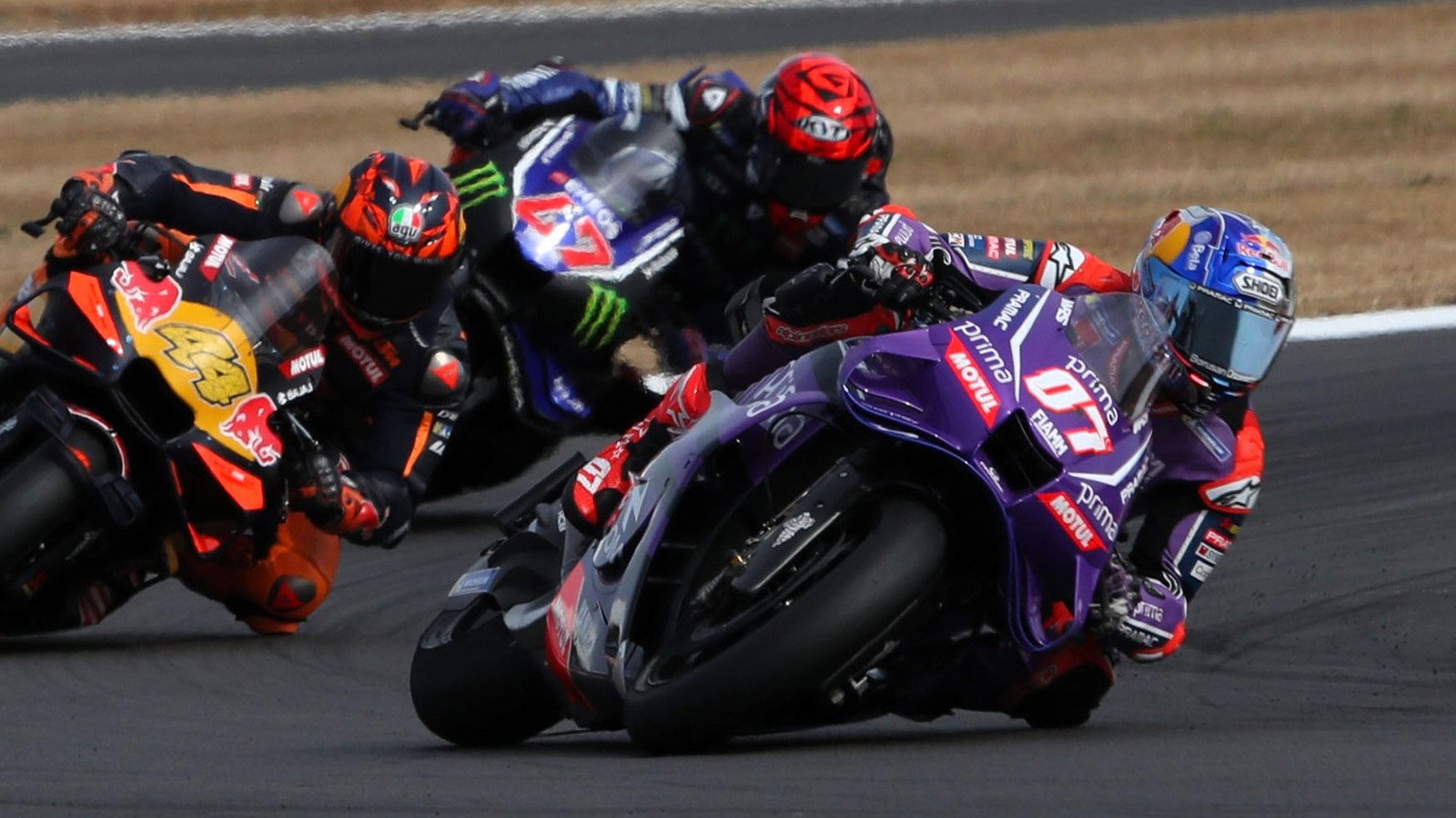 Augusto Fernandez chases Pol Espargaro and Toprak Razgatlioglu, 2026 Silverstone MotoGP.