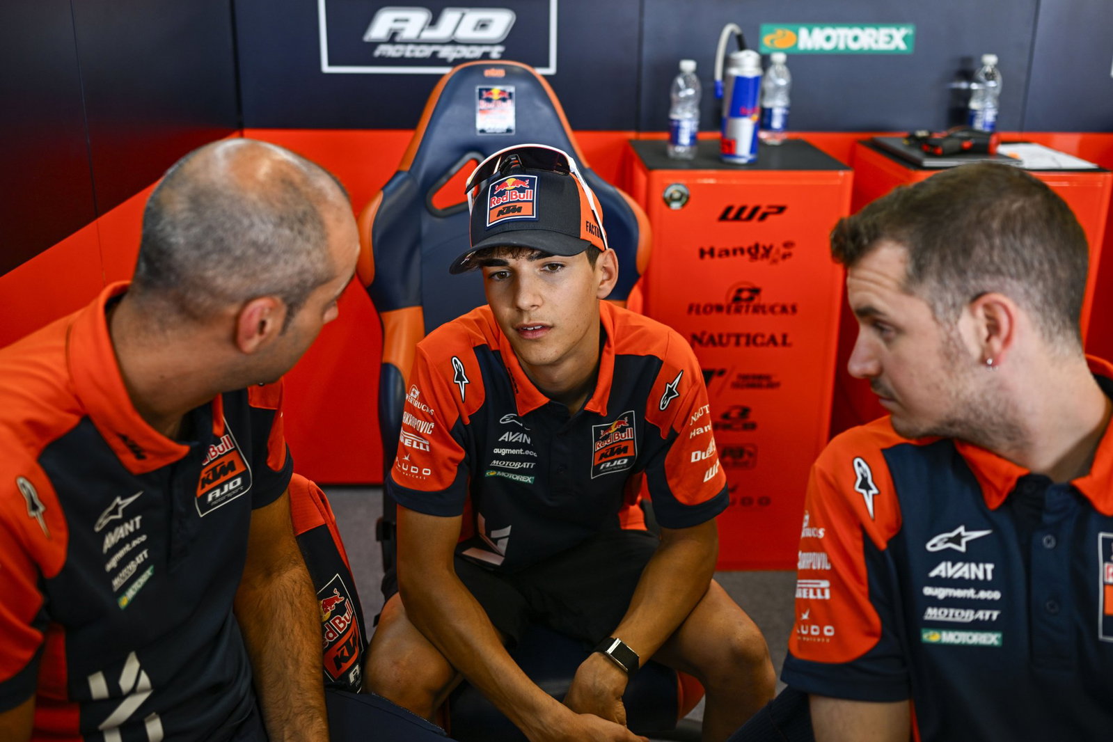 Brian Uriarte talks with his KTM Ajo team at 2026 Moto3 British Grand Prix. Credit: Gold and Goose.