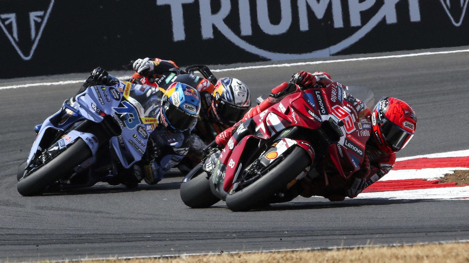 Marc Marquez under pressure from Alex Marquez and Pedro Acosta.2026 Silverstone MotoGP. 