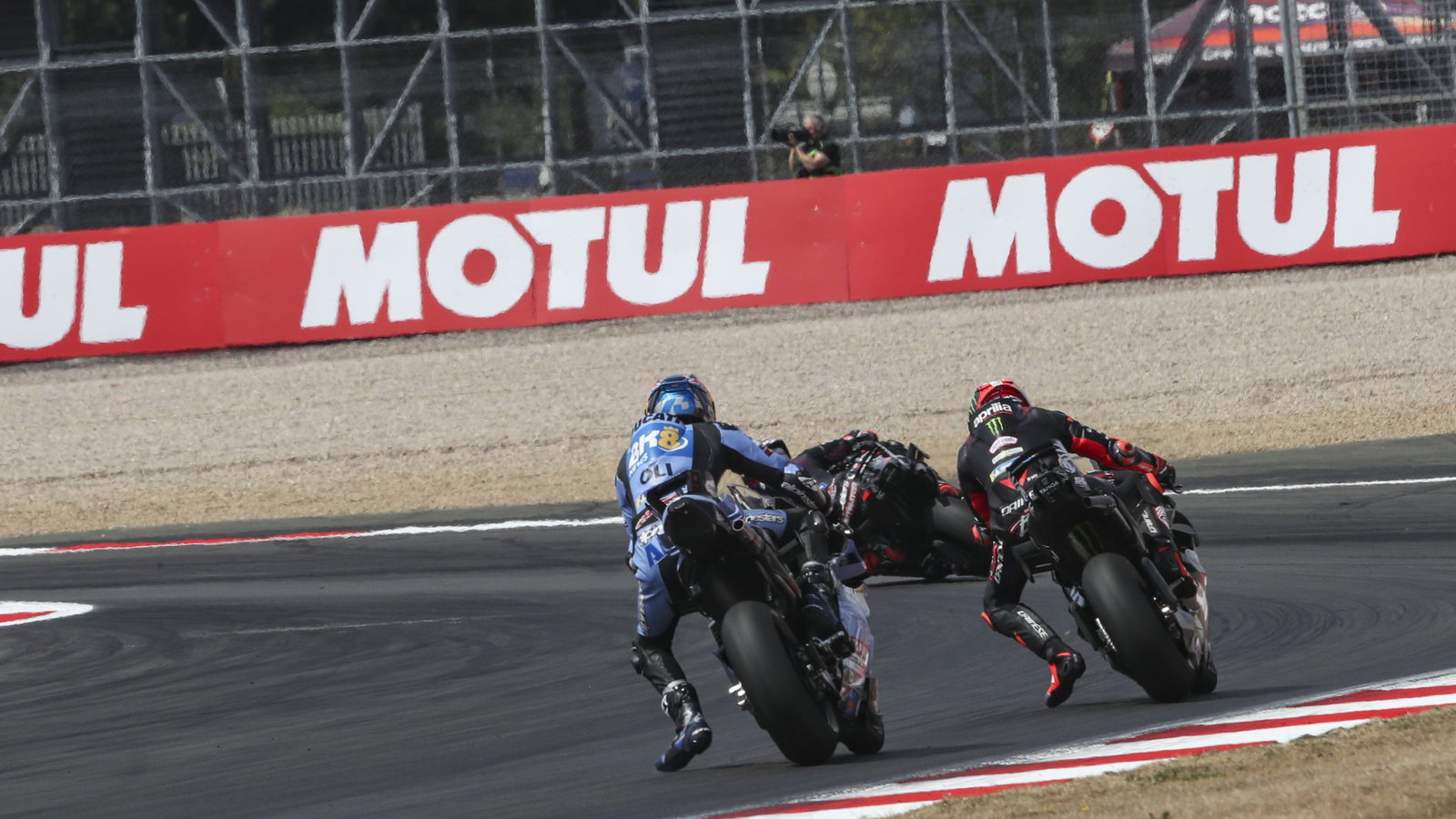 Alex Marquez chases Marco Bezzecchi, 2026 MotoGP British Grand Prix. Credit: Gold and Goose.