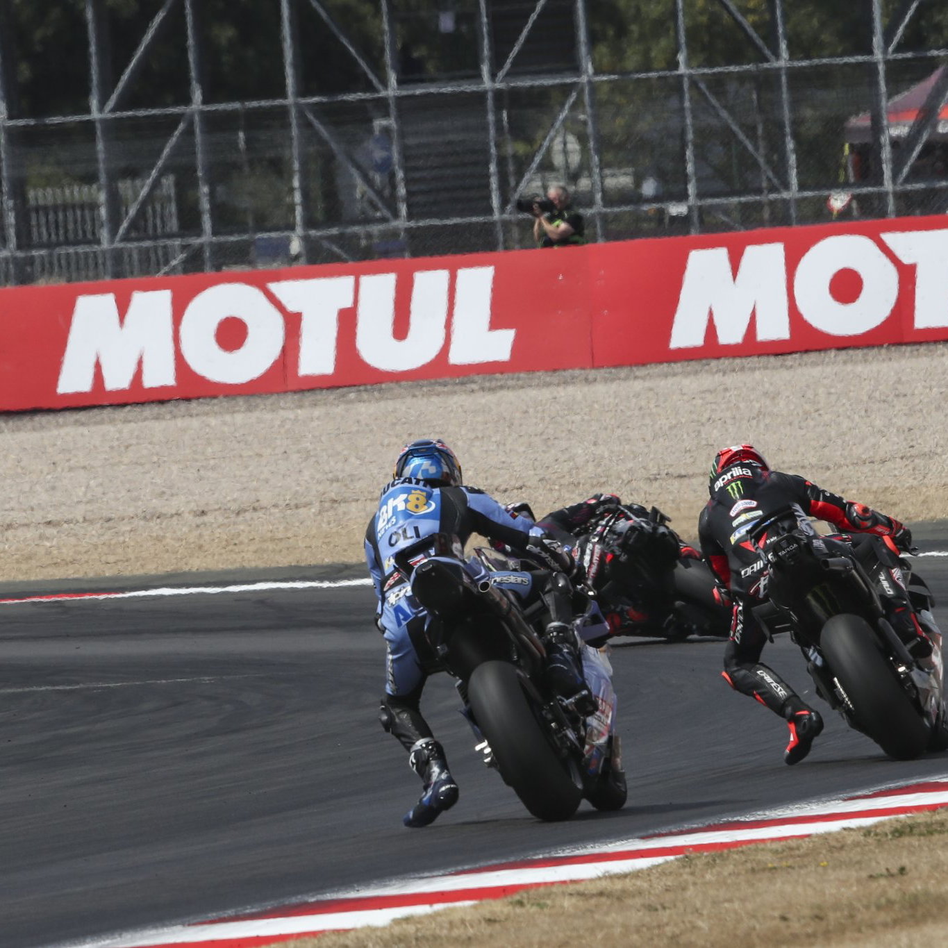 Alex Marquez chases Marco Bezzecchi, 2026 MotoGP British Grand Prix. Credit: Gold and Goose.