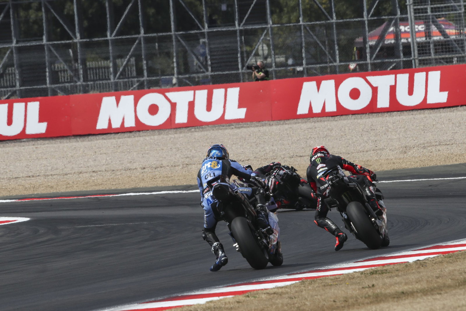 Alex Marquez chases Marco Bezzecchi, 2026 MotoGP British Grand Prix. Credit: Gold and Goose.