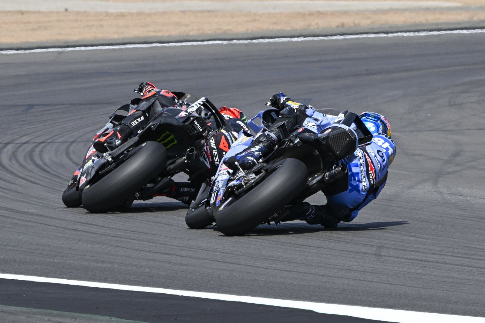 Alex Marquez chases Marco Bezzecchi, 2026 MotoGP British Grand Prix. Credit: Gold and Goose.