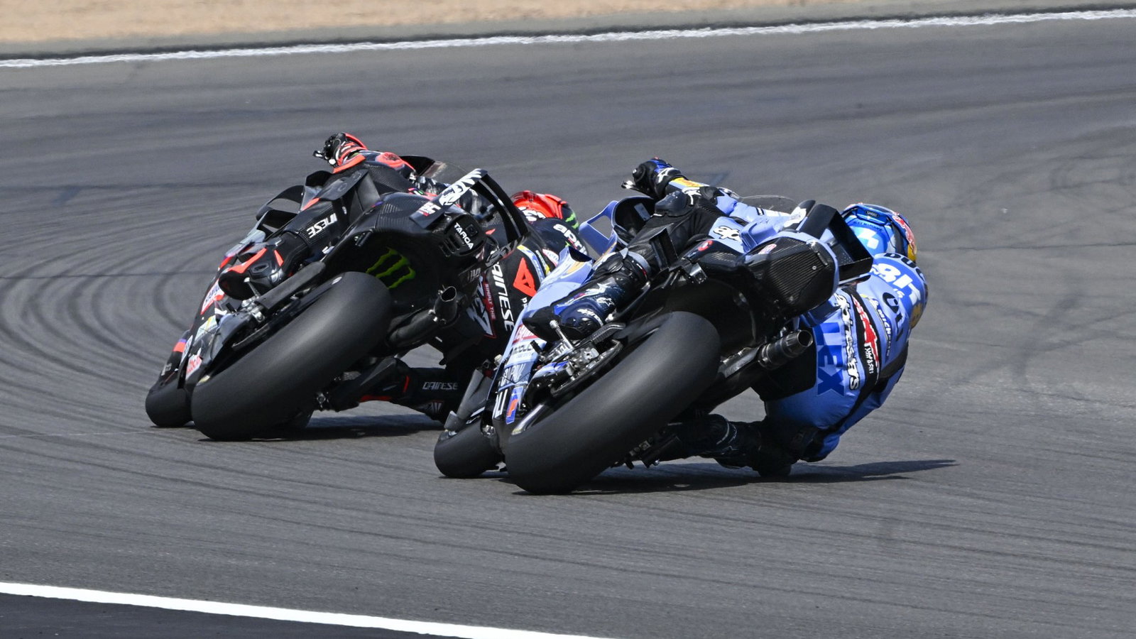 Alex Marquez chases Marco Bezzecchi, 2026 MotoGP British Grand Prix. Credit: Gold and Goose.