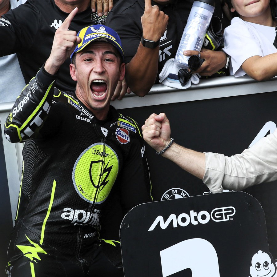 Raul Fernandez, Justin Marks celebrate Silverstone MotoGP victory.