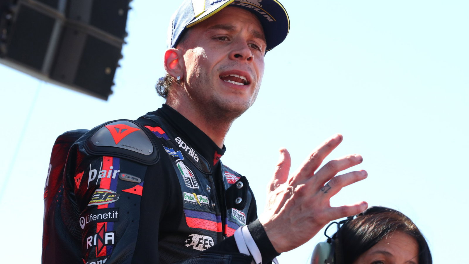Marco Bezzecchi on the 2026 Aragon MotoGP Sprint podium.