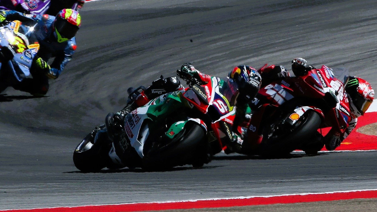 Johann Zarco battles Pecco Bagnaia, 2026 Aragon MotoGP Sprint.
