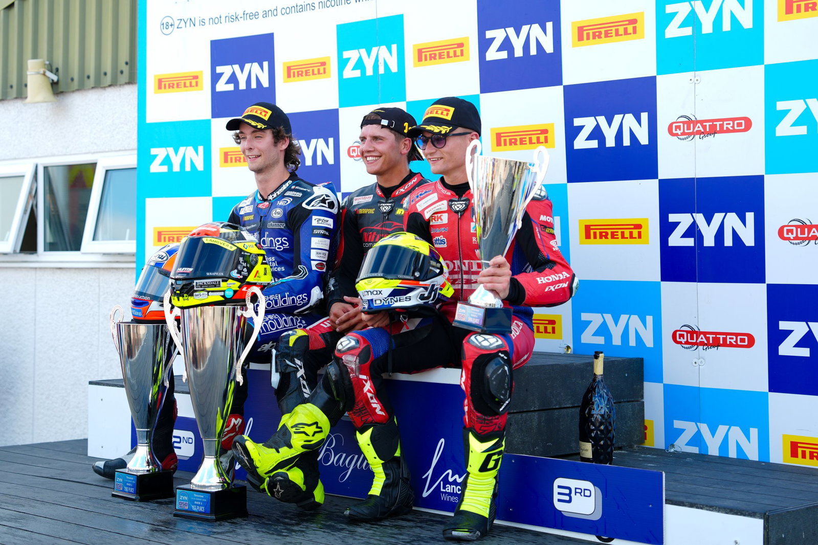Rory Skinner with Kyle Ryde, Ryan Vickers on 2026 Thruxton BSB Race 1 podium. Credit: Ian Hopgood Photography.