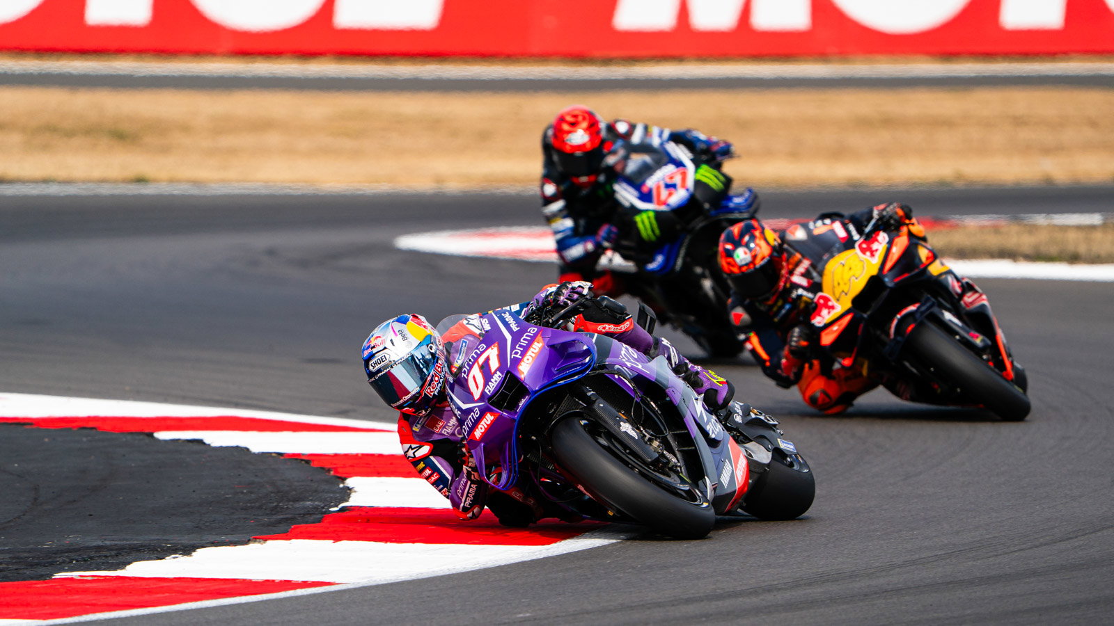 Toprak Razgatlioglu leads Pol Espargaro, Augusto Fernandez, 2026 MotoGP British Grand Prix. Credit: Tony Goldsmith.