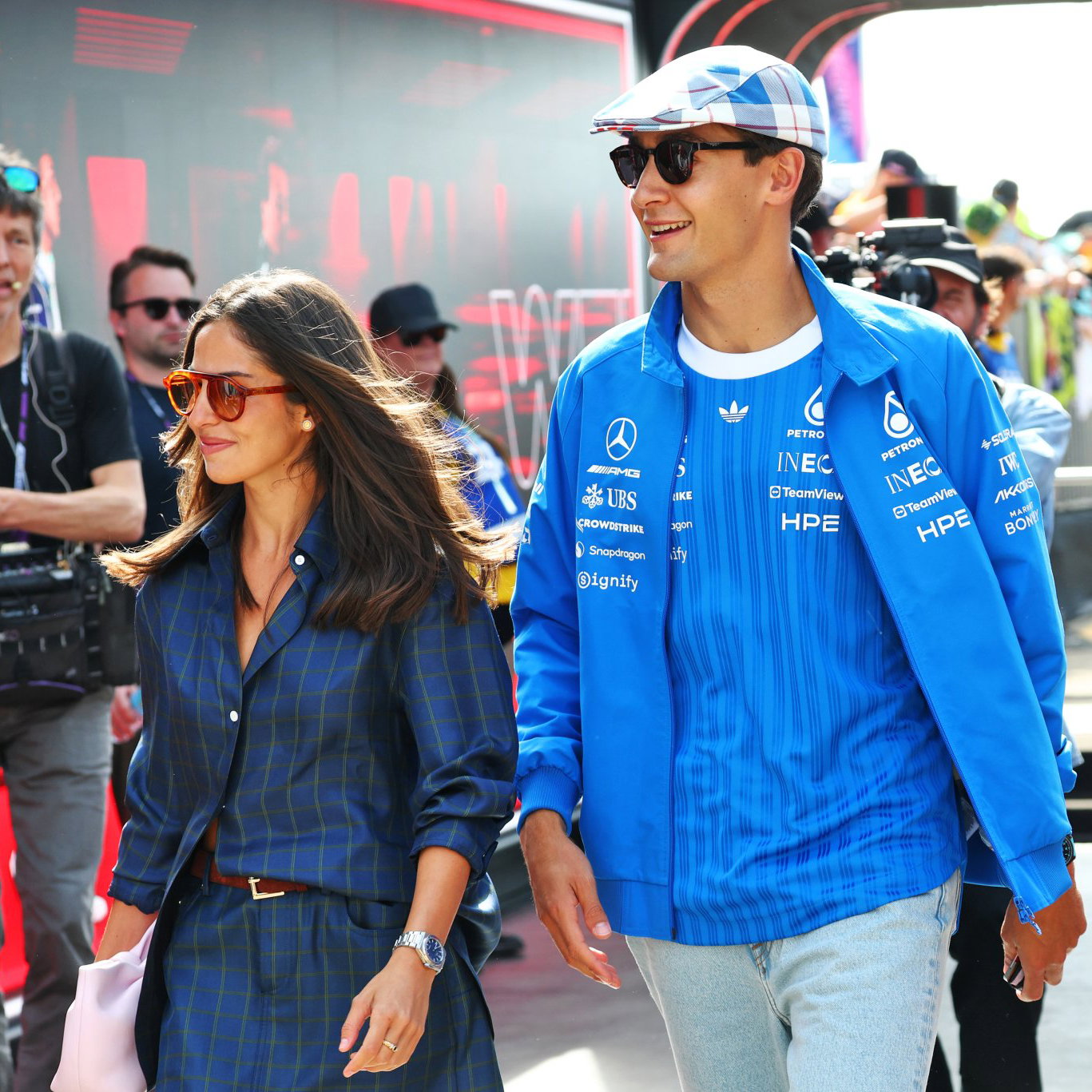 Carmen Montero Mundt and George Russell in the F1 paddock