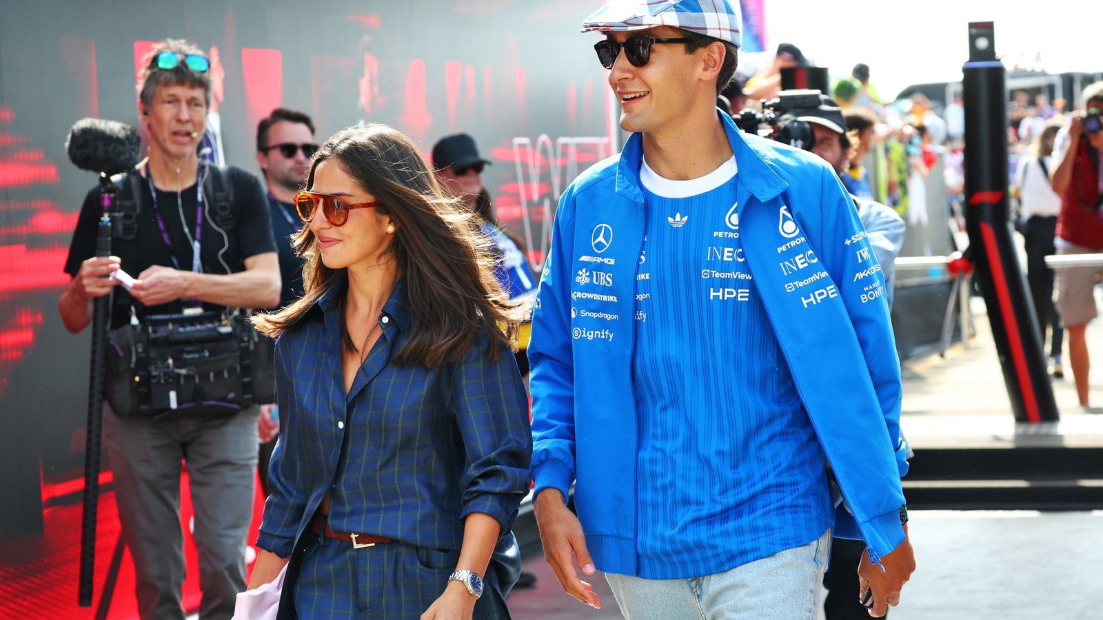 Carmen Montero Mundt and George Russell in the F1 paddock