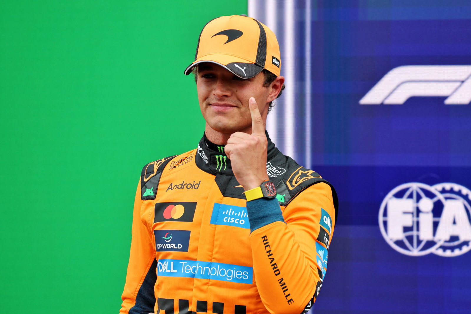 Lando Norris celebrates taking his second pole of the season 