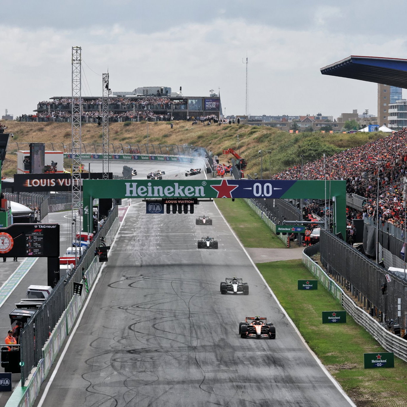 Max Verstappen smashes into the barriers in the opening stages
