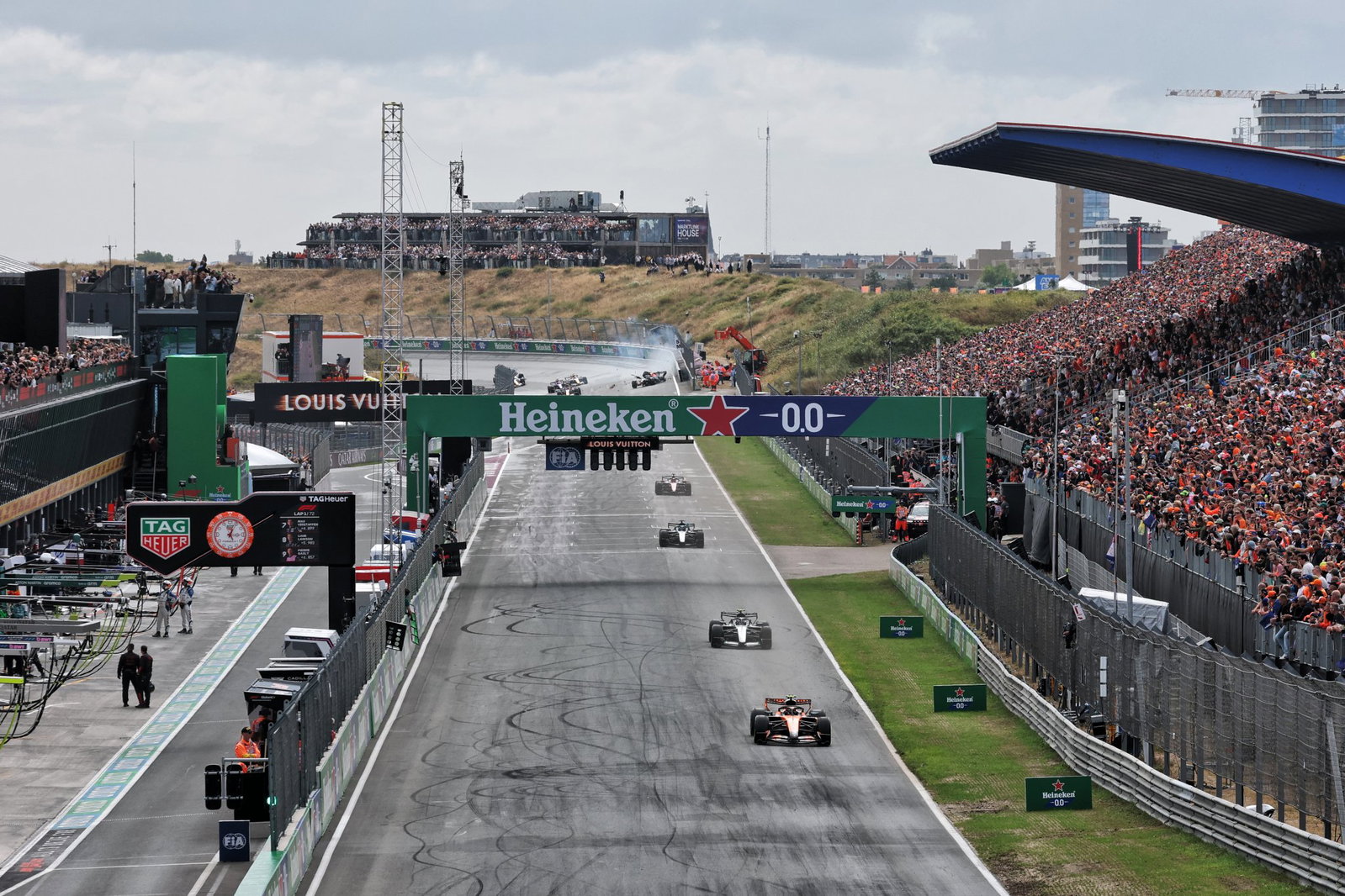 Max Verstappen smashes into the barriers in the opening stages