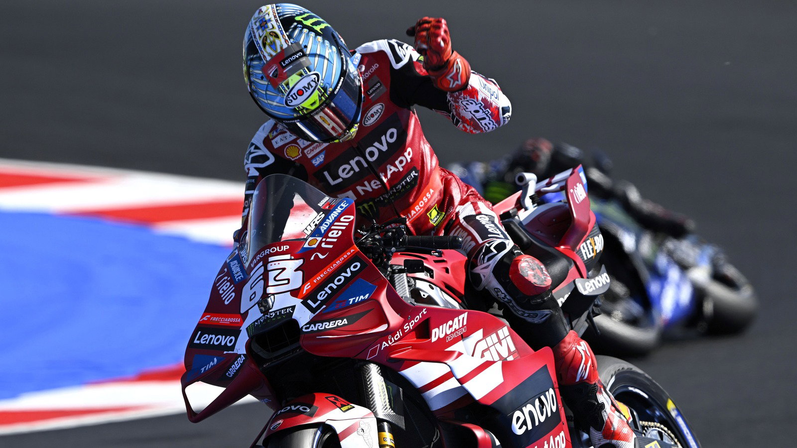 Pecco Bagnaia hits the fuel tank in frustration after losing the rear, 2026 Misano MotoGP. 