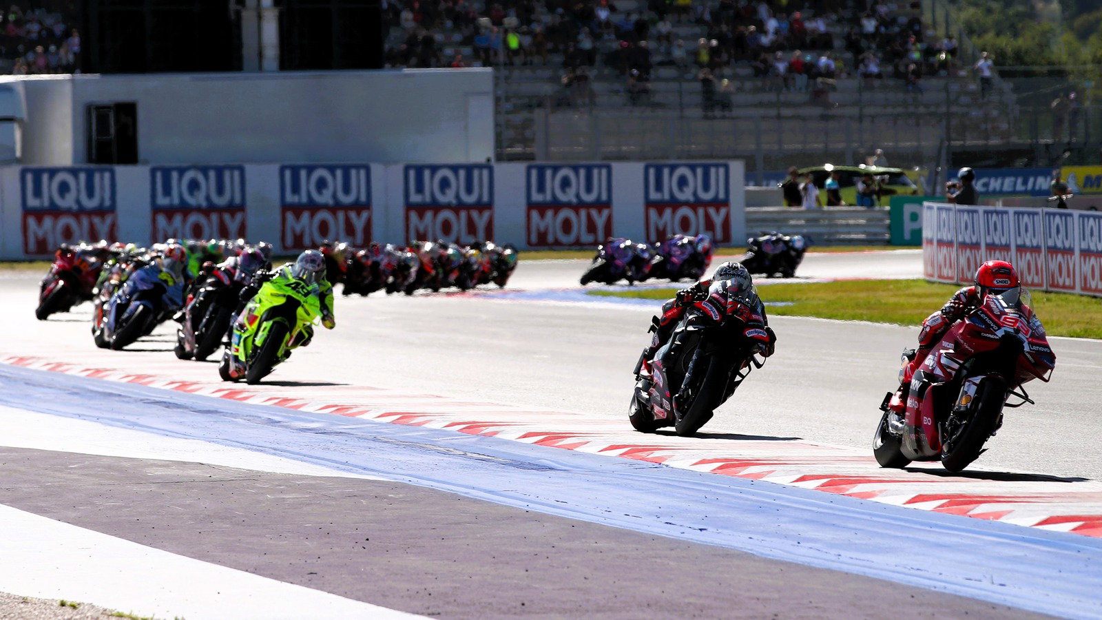 Marc Marquez leads Marco Bezzecchi, 2026 Misano MotoGP Sprint.