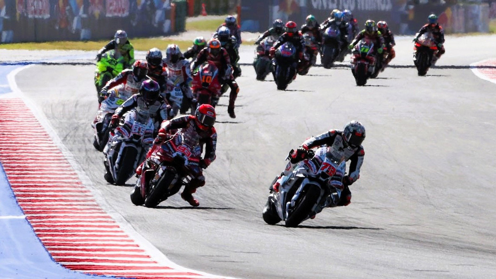 Bezzecchi leads Marquez, opening lap, 2026 Misano MotoGP. 