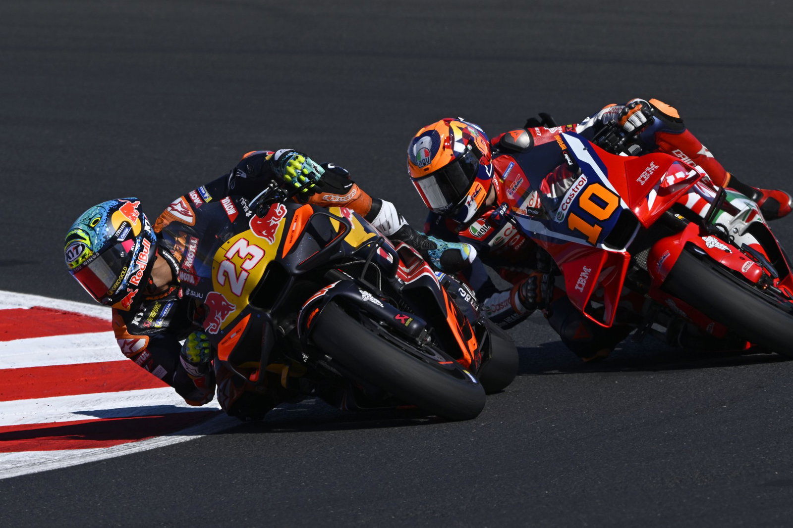 Enea Bastianini passes Luca Marini, 2026 MotoGP San Marino Grand Prix. Credit: Gold and Goose.