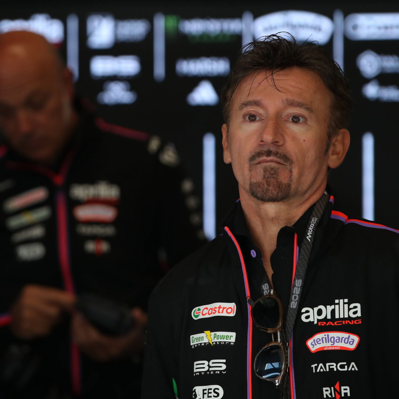 Max Biaggi, 2026 MotoGP Austrian Grand Prix, Apirlia pit box. Credit: Gold and Goose.