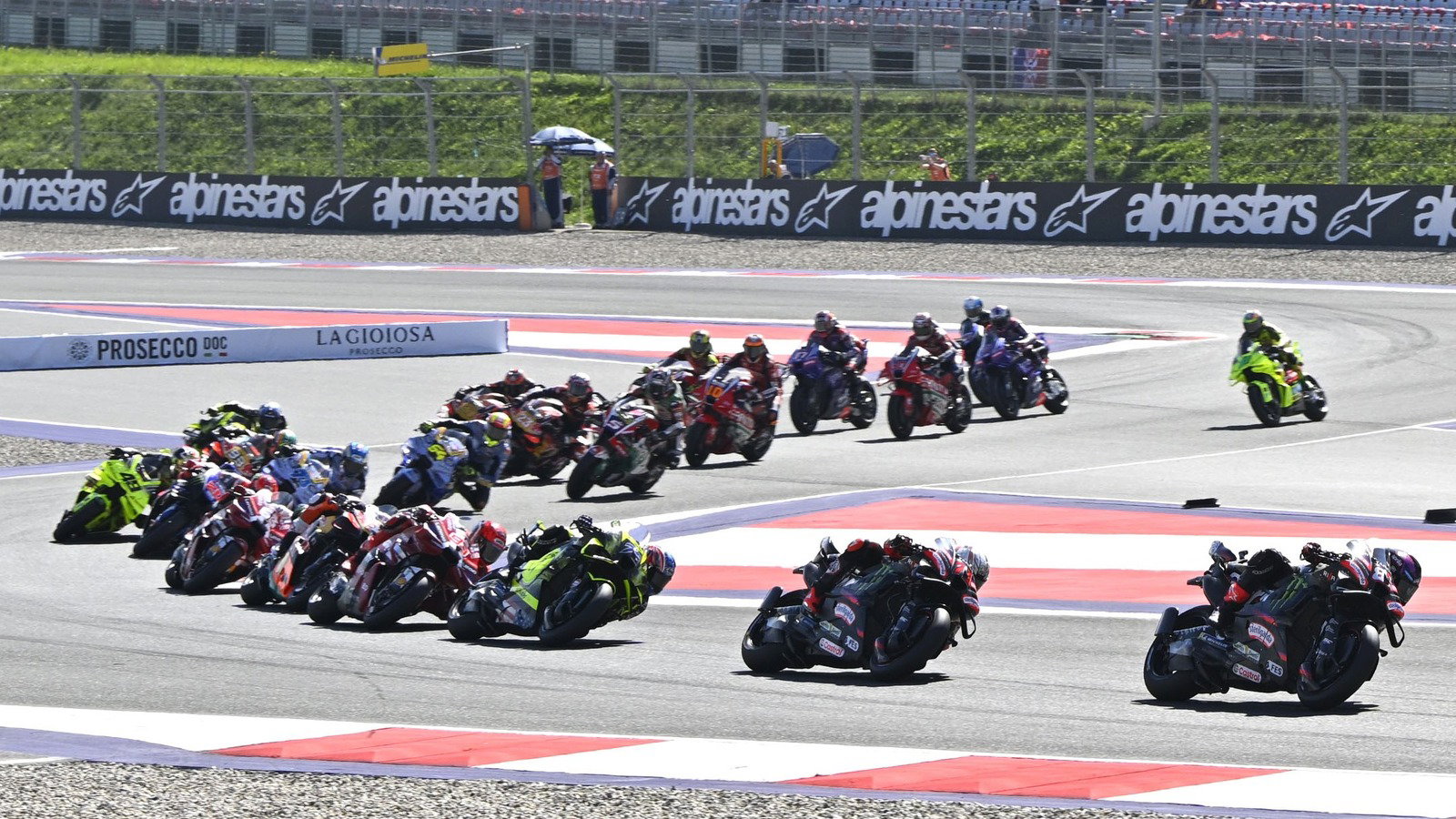 Diggia deep in the pack, as team-mate Franco Morbidelli runs wide, 2026 Red Bull Ring MotoGP.