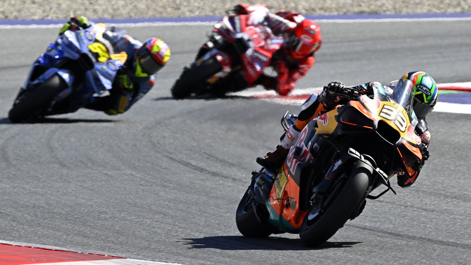 Brad Binder leads Fermin Aldeguer and Marc Marquez, 2026 Red Bull Ring MotoGP.
