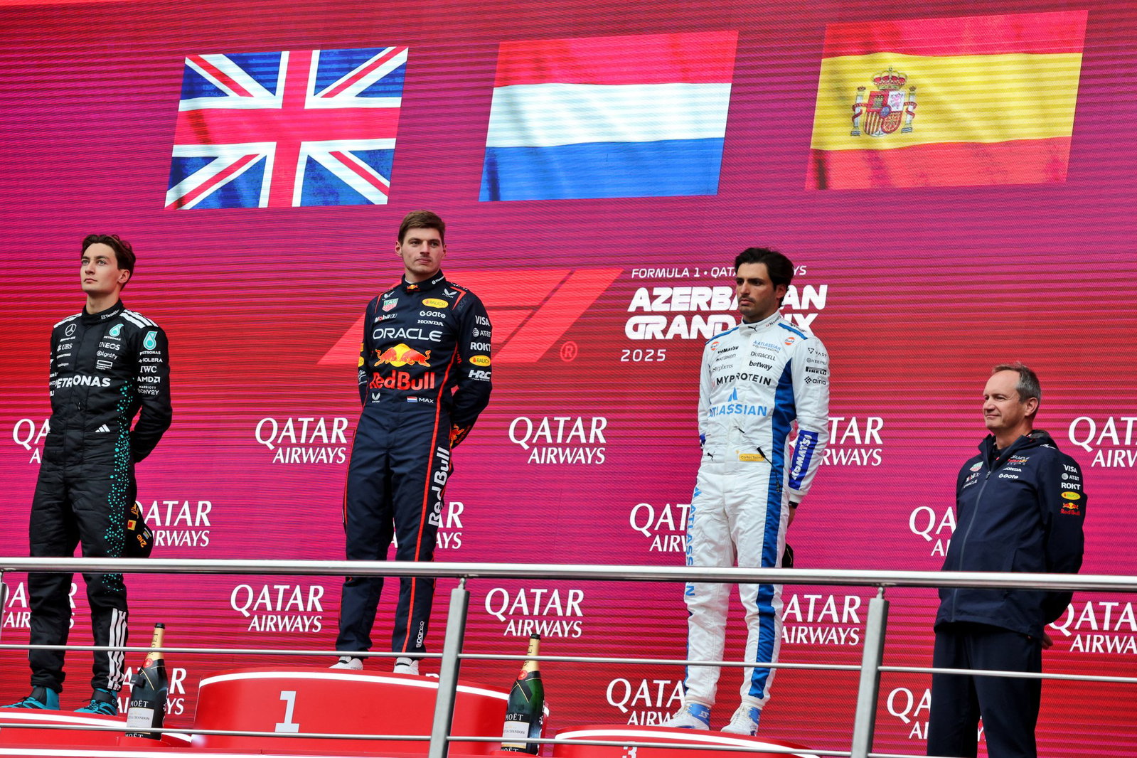 George Russell, Max Verstappen and Carlos Sainz on the Baku podium in 2025