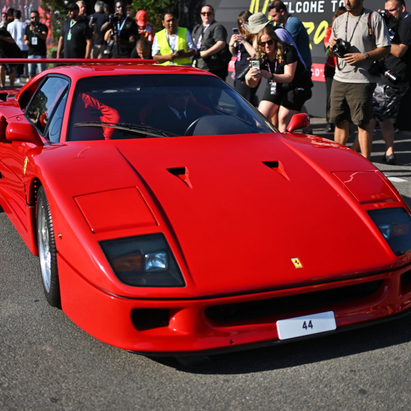Lewis Hamilton arrives in his Ferrari F40