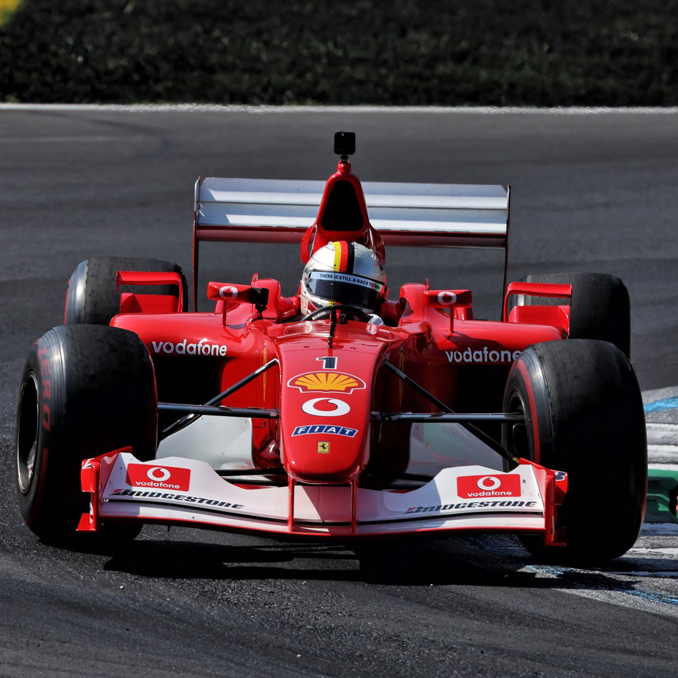 Sebastian Vettel drove Michael Schumacher's 2002 title-winning Ferrari at Monza